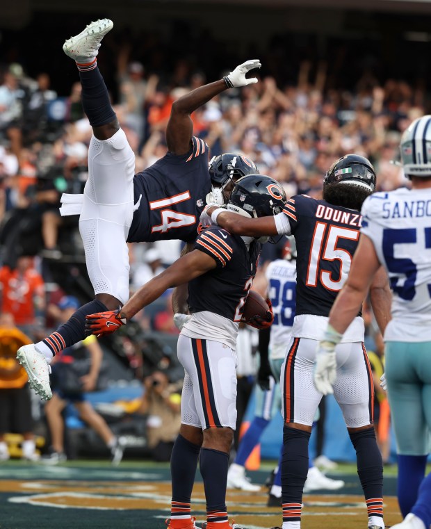 Chicago Bears wide receiver DJ Moore celebrates his touchdown against...