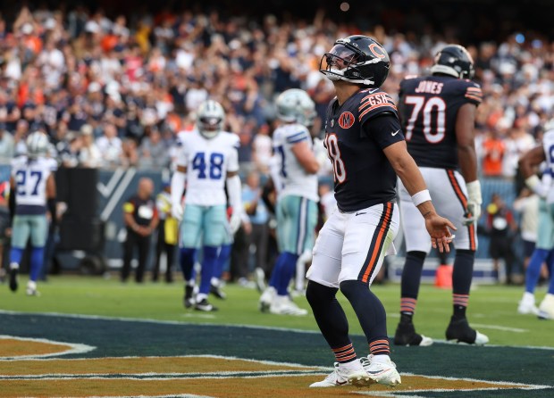 Chicago Bears quarterback Caleb Williams celebrates his touchdown pass to...