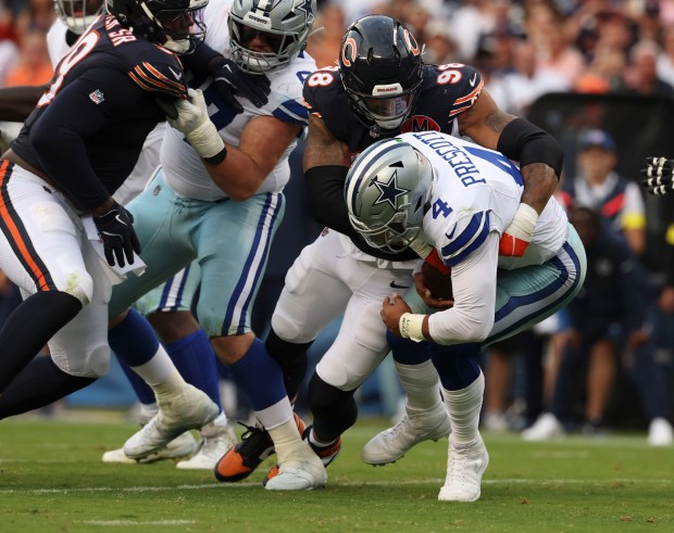 Chicago Bears defensive end Montez Sweat (98) sacks Dallas Cowboys...