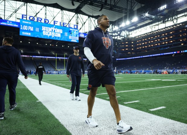 Bears general manager Ryan Poles walks the perimeter of the field before a game against the Lions at Ford Field on Sept. 14, 2025, in Detroit. (John J. Kim/Chicago Tribune)