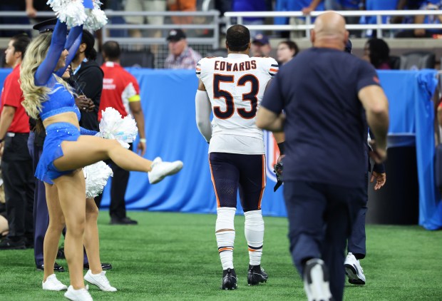 Bears linebacker T.J. Edwards heads to the locker room after...