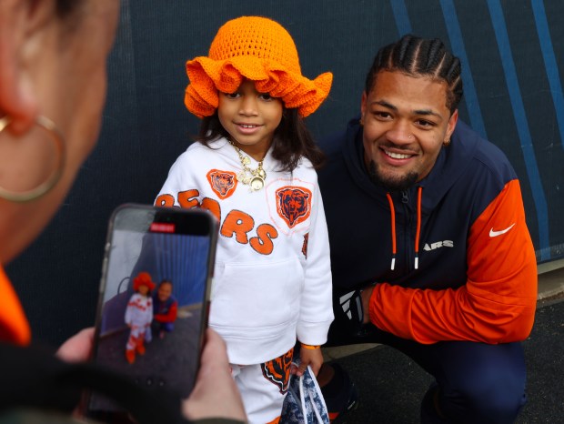 Chicago Bears wide receiver Rome Odunze (15) poses for a...