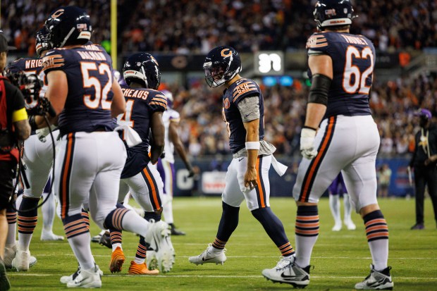 Chicago Bears quarterback Caleb Williams (18) celebrates after scoring a...
