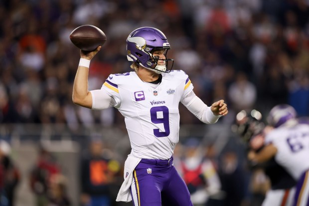 Minnesota Vikings quarterback J.J. McCarthy (9) throws a pass during...