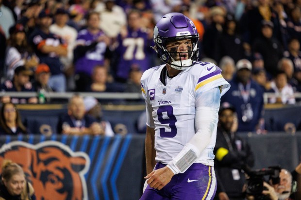 Minnesota Vikings quarterback J.J. McCarthy (9) celebrates after scoring a...