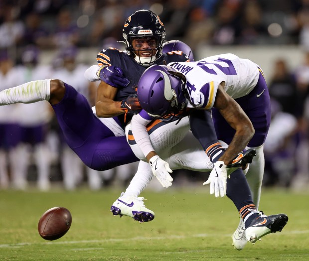 Minnesota Vikings cornerback Isaiah Rodgers and safety Jay Ward (right)...