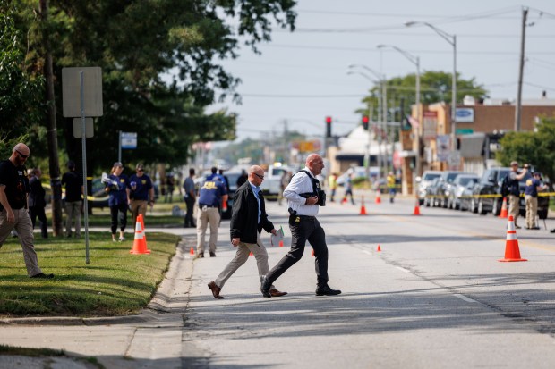 Members of the Federal Bureau of Investigation and other law...