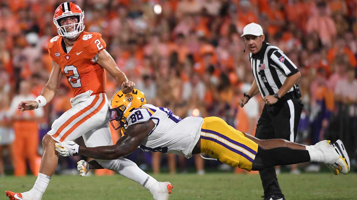 Clemson Tigers quarterback Cade Klubnik (2) is pressured by LSU Tigers defensive lineman Bernard Gooden (88) Saturday, Aug. 30, 2025 during the NCAA football game at Memorial Stadium in Clemson, South Carolina. LSU Tigers won 17-10.