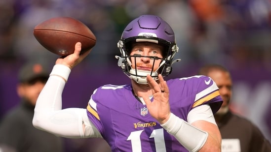 Minnesota Vikings quarterback Carson Wentz throws before an NFL football game against the Cincinnati Bengals(AP)