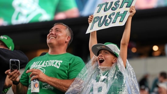 Philadelphia Eagles fans cheer during warmups before an NFL football game against the Dallas Cowboys Thursday(AP)