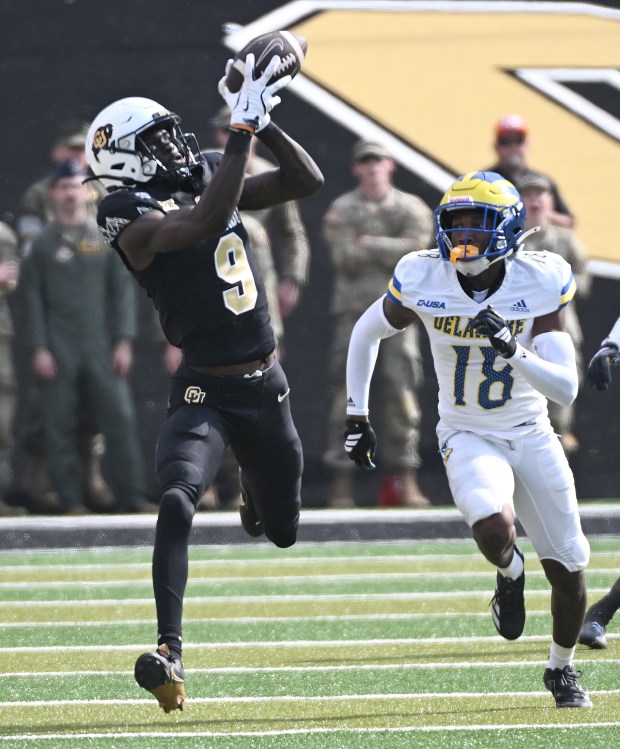 Colorado Buffaloes receiver Sincere Brown makes a catch in front...