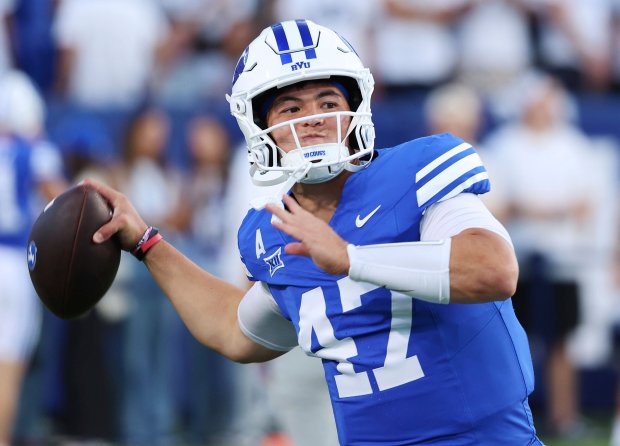BYU quarterback Bear Bachmeier warms up against Stanford during pregame of an NCAA college football game on Saturday, Sept. 6, 2025, in Provo, Utah. (AP Photo/Jeffrey D. Allred)