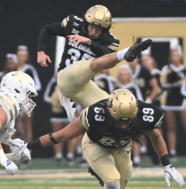 Colorado Buffaloes punter Damon Greaves punts the ball against Georgia Tech at Folsom Field in Boulder, Colo., on Friday, Aug. 29, 2025.(Photo by Cliff Grassmick/Staff Photographer)