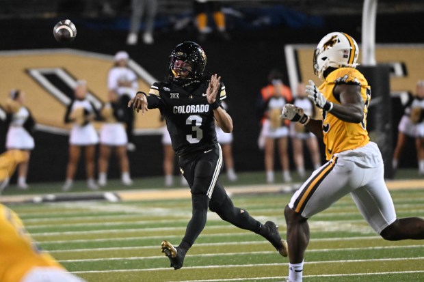 University of Colorado Buffaloes Colorado quarterback Kaidon Salter (3) passes...