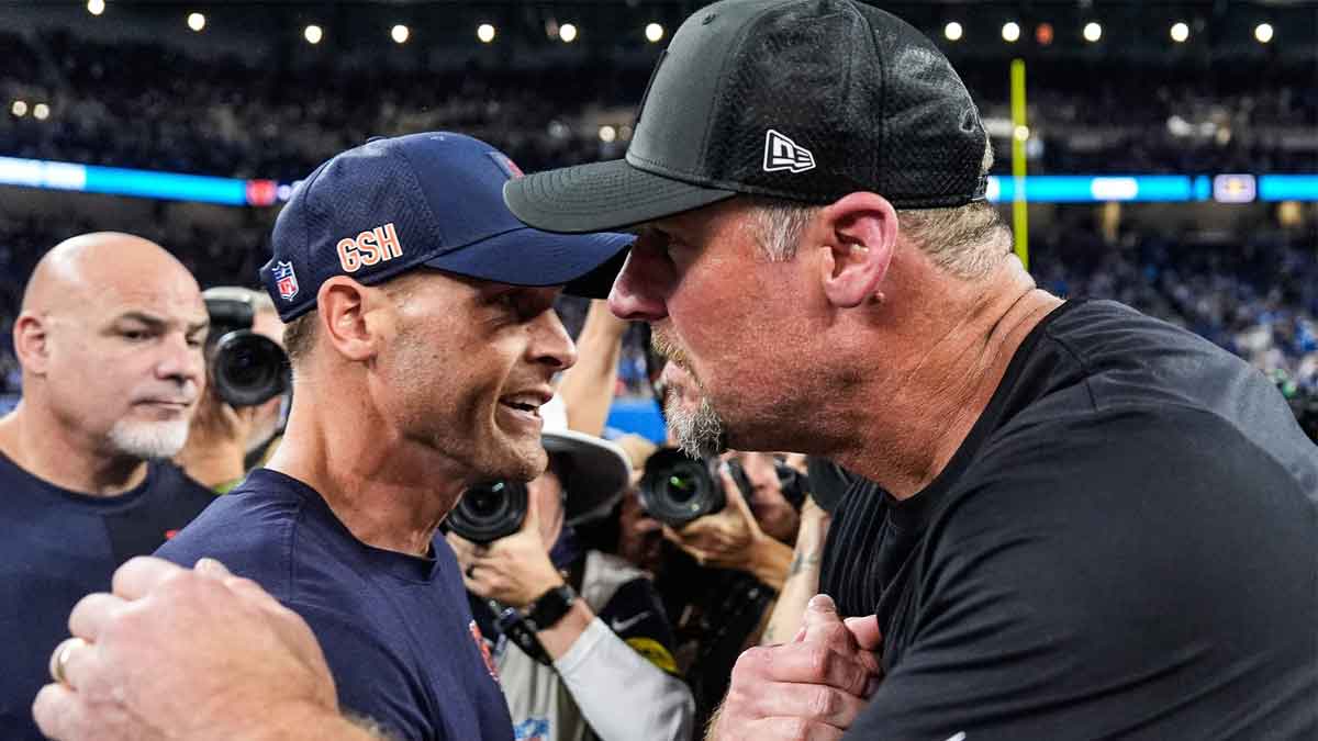 Detroit Lions head coach Dan Campbell, right, shakes hands with Chicago Bears head coach Ben Johnson after 52-21 win over the Bears at Ford Field in Detroit on Sunday, Sept. 14, 2025.