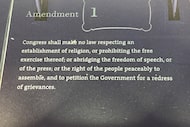 The First Amendment is engraved on a plaque at the National Constitution Center in...
