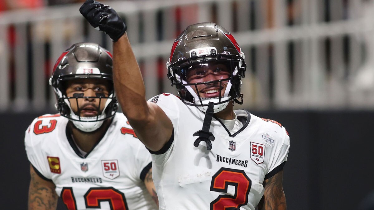 Tampa Bay Buccaneers wide receiver Emeka Egbuka (2) reacts after scoring a touchdown against the Atlanta Falcons during the second quarter at Mercedes-Benz Stadium.