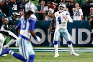 Dallas Cowboys quarterback Dak Prescott (4) throws a pass to wide receiver CeeDee Lamb (88)...