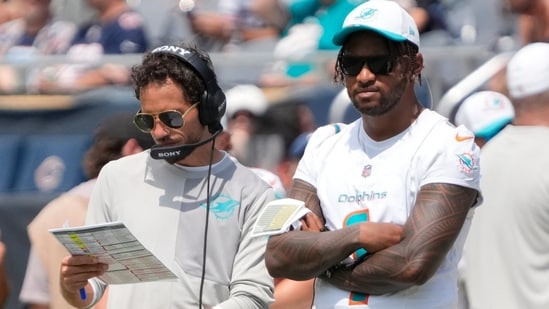 Miami Dolphins head coach Mike McDaniels with quarterback Tua Tagovailoa.(IMAGN IMAGES via Reuters Connect)
