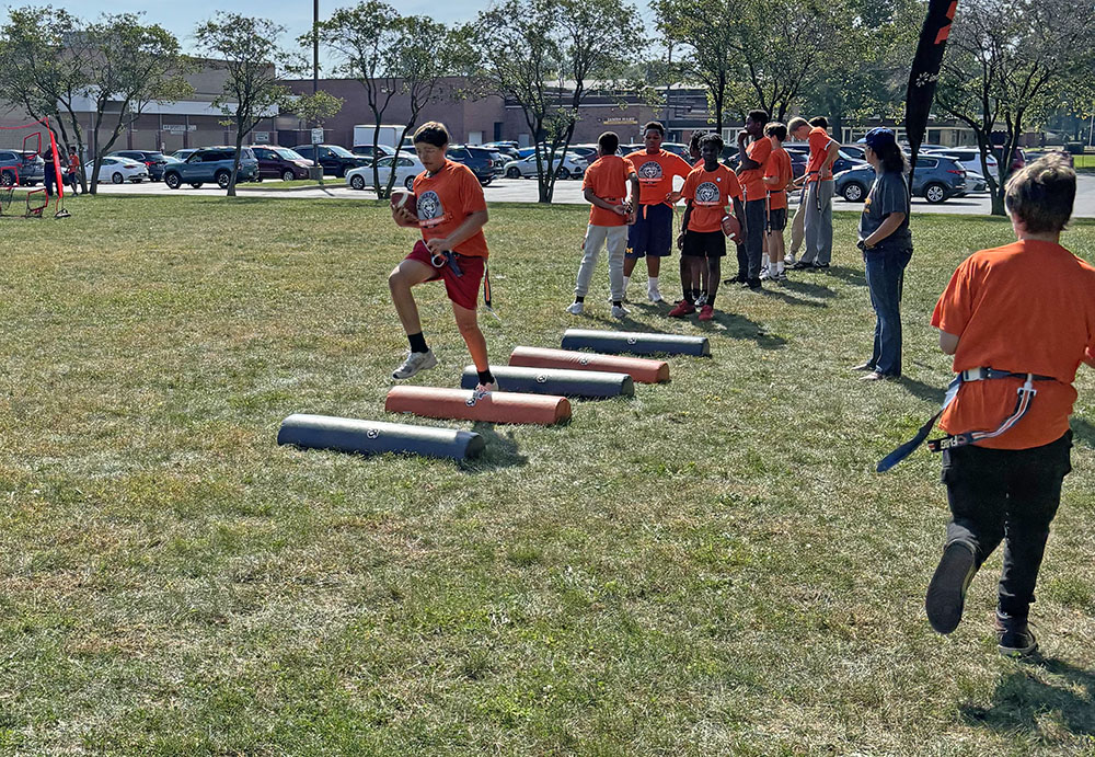 James Hart School students test their footwork at the Monsters Flag Football program sponsored by the Chicago Bears. (Marilyn Thomas/H-F Chronicle)