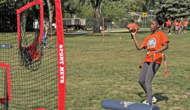 A student tests her passing ability during the Monsters Flag Football program Sept. 19 at Hart School. (Marilyn Thomas/H-F Chronicle)