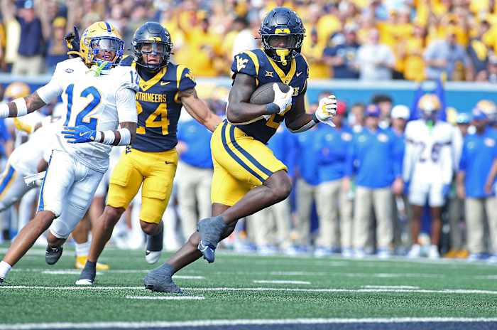 Edwards' short TD run in overtime leads West Virginia over Pittsburgh 31-24 in the Backyard Brawl