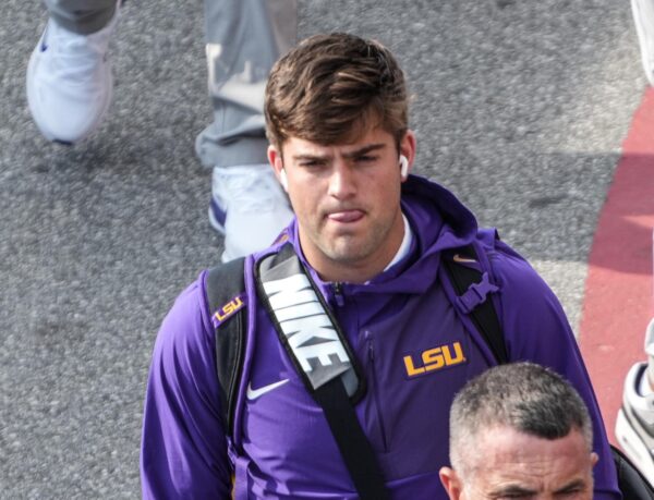 Louisiana State University quarterback Garrett Nussmeier (13) arrives off the bus during Clemson Tiger Walk before kickoff at Memorial Stadium in Clemson