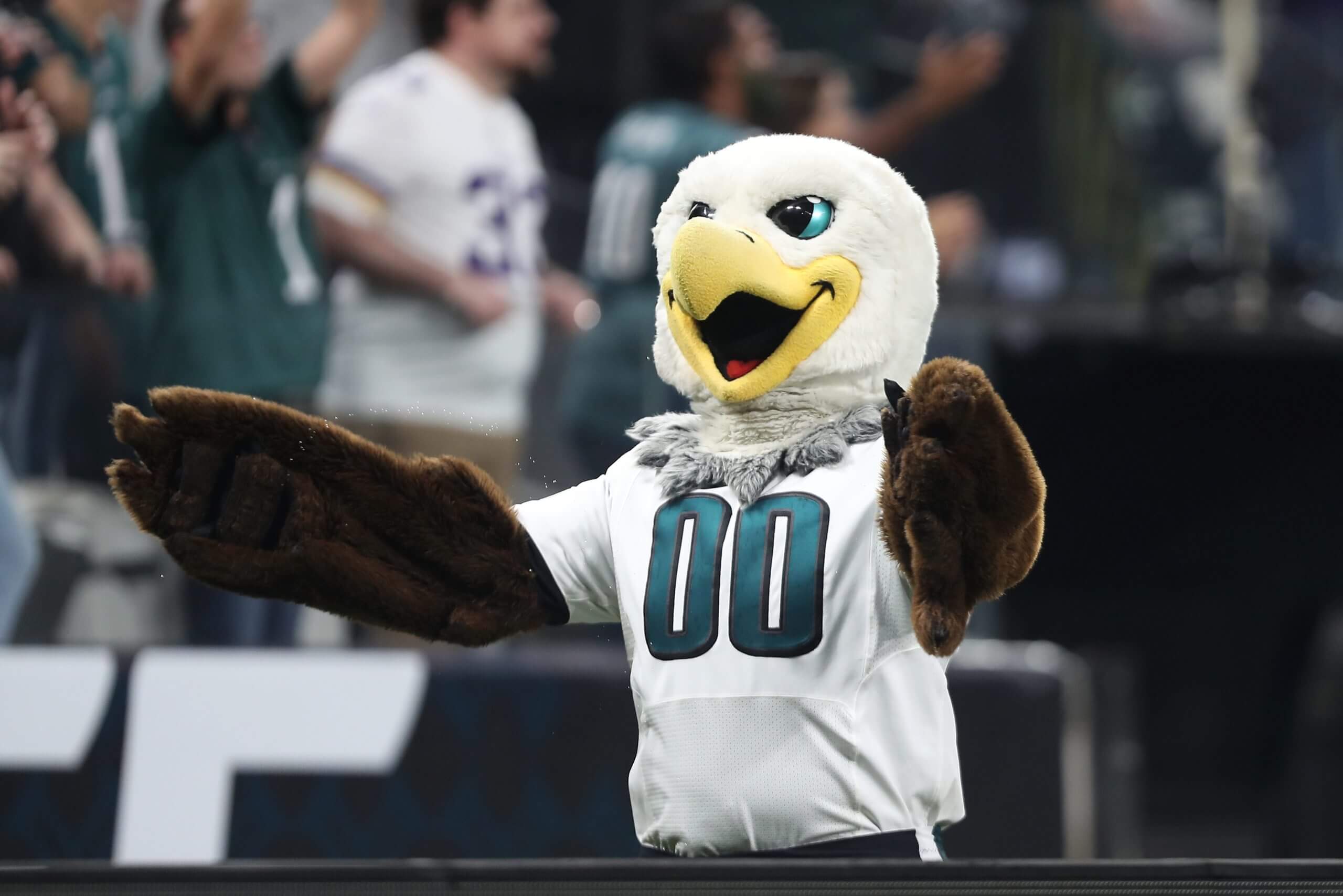 Swoop leads a rendition of "Fly Eagles Fly." He is the Eagle in question. (Wagner Meier / Getty Images)
