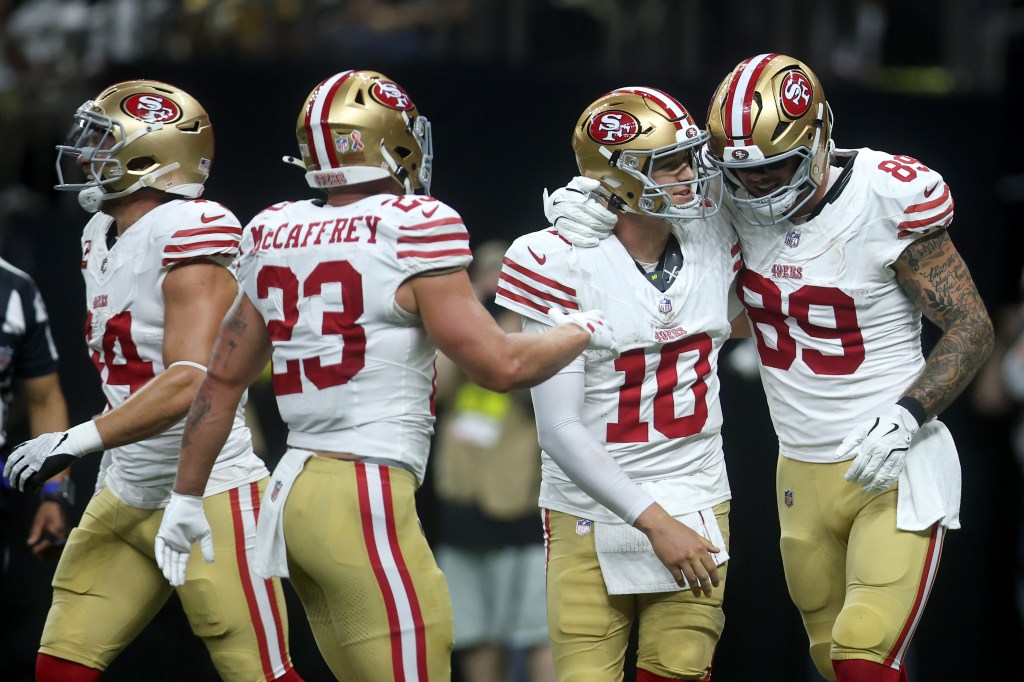 Mac Jones wins debut with three touchdown passes