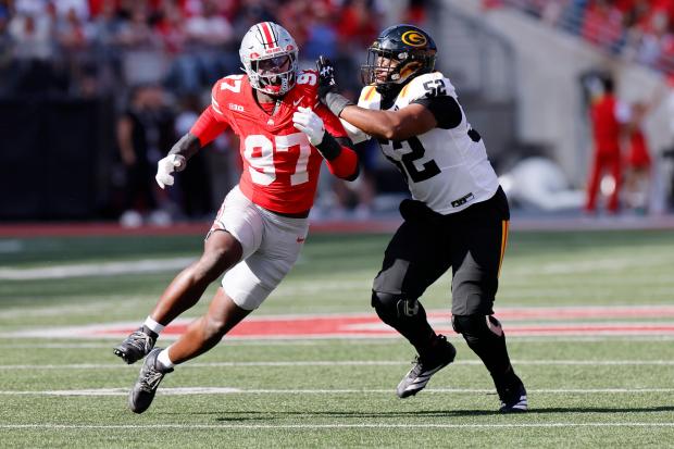 Ohio State defensive lineman Kenyatta Jackson, left, tries to get get around Grambling State offensive lineman Erron Mahoney-Bean during the first half of an NCAA college football game, Saturday, Sept. 6, 2025, in Columbus, Ohio. (AP Photo/Jay LaPrete)