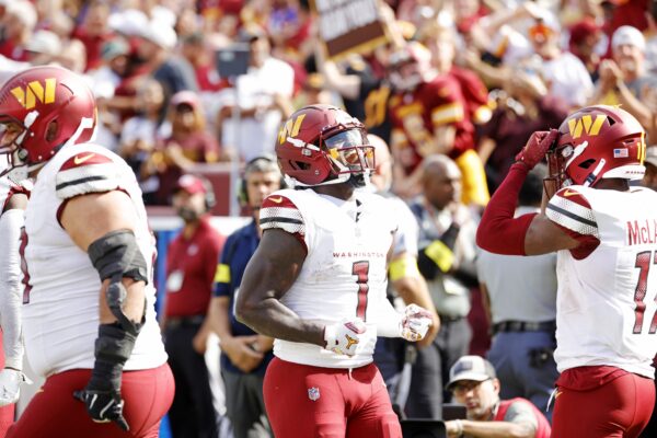 Washington Commanders wide receiver Deebo Samuel (1) reacts after a touchdown during the third quarter against the New York Giants at Northwest Stadium.