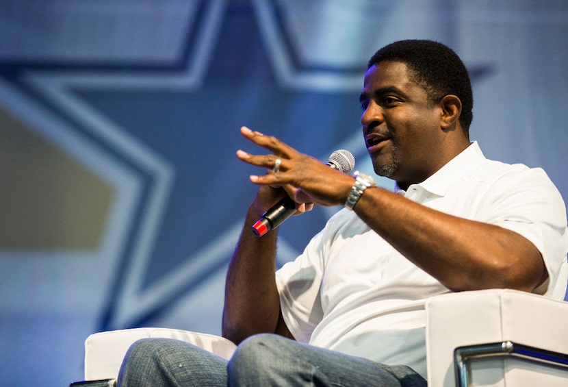 Former Dallas Cowboys first round draft pick, Greg Ellis is interviewed by sportscaster Brad...