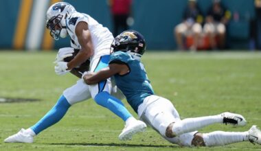Jacksonville cornerback Tyson Campbell tackled Carolina wide receiver Tetairoa McMillan in the first half Sunday in Jacksonville, Fla.
