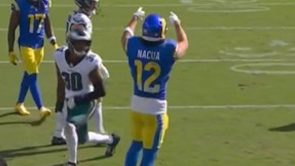 Puka Nacua, number 12, celebrating a play on the field.