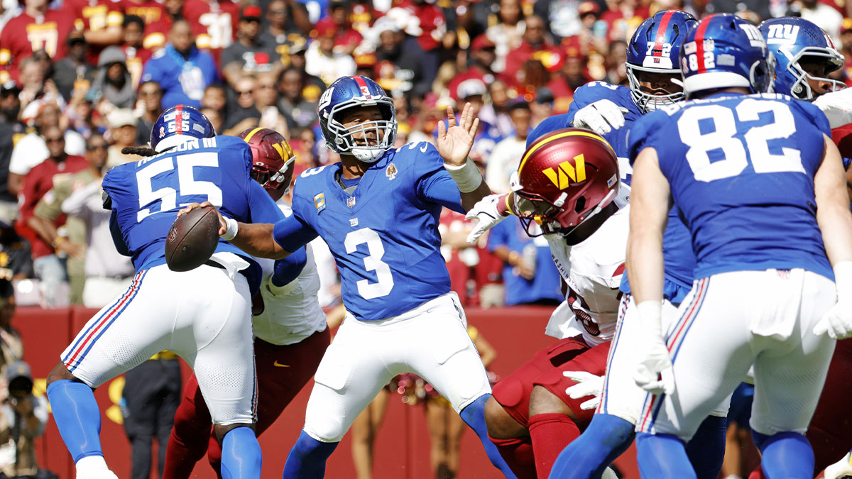 New York Giants quarterback Russell Wilson (3) makes a pass during the third quarter against the Washington Commanders at Northwest Stadium. 