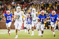 Baylor quarterback Seth Russell (17) races through the SMU defense on a 38-yard run during...