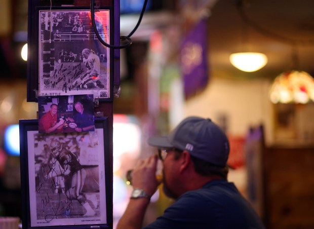 Sports memorabilia hangs on display at the Canyon Inn restaurant on Monday, July 21, 2025, in Redwood City, Calif. The Canyon Inn restaurant used to be just down the street from 49ers practice facility, and the team had been so bad that in 1981 they decided to offer free meals to players and staff following a win. That year turned out to be their first super bowl season. (Aric Crabb/Bay Area News Group)