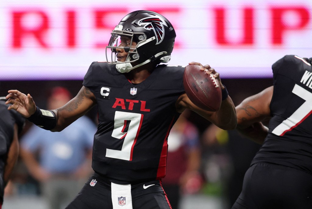 Atlanta Falcons quarterback throwing a football.