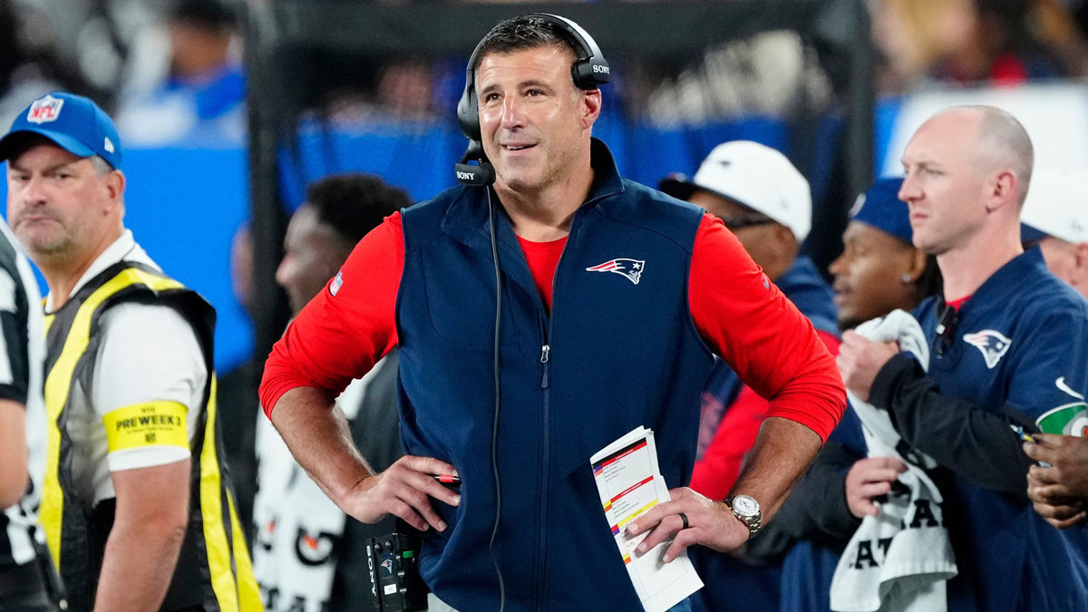 New England Patriots Head Coach, Mike Vrabel is shown on the sideline,