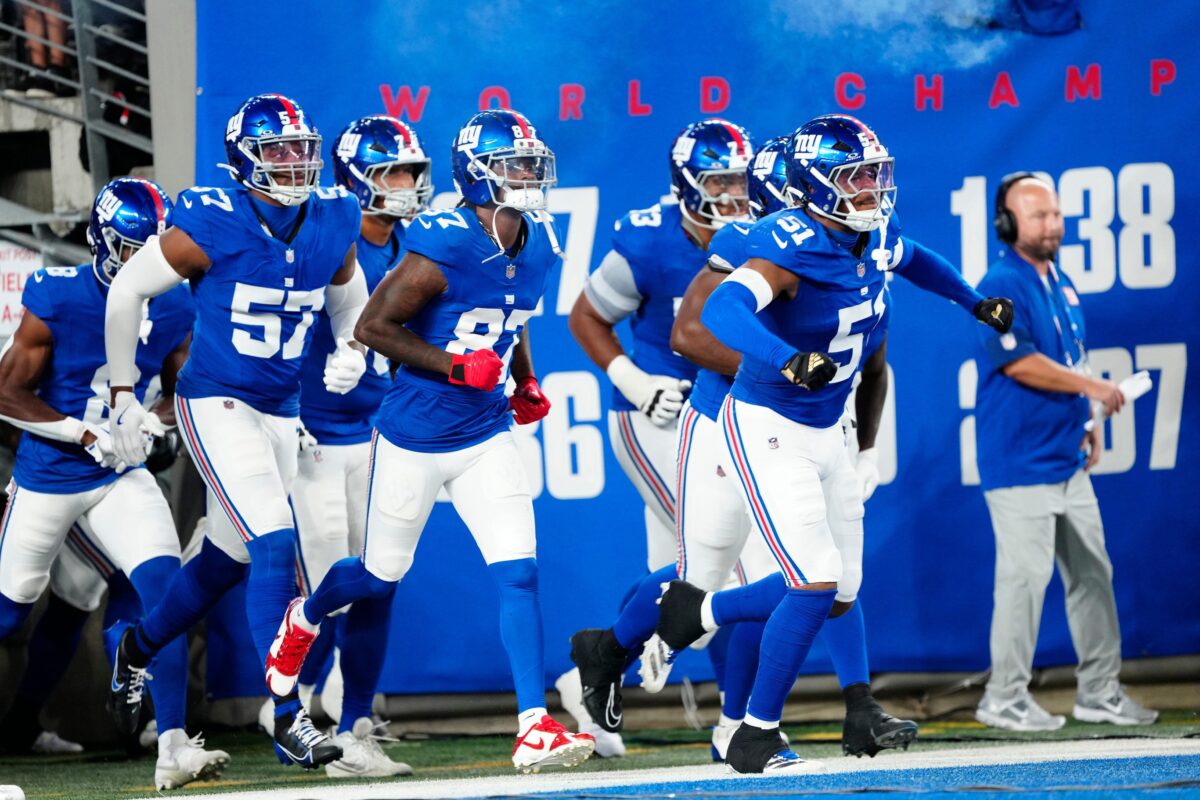 The New York Giants take the field, Thursday, August 21, 2025, in East Rutherford.