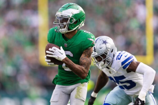 Philadelphia Eagles wide receiver DeVonta Smith (6) makes a first down catch past Dallas Cowboys cornerback Andrew Booth Jr. (25) during the second quarter at Lincoln Financial Field.