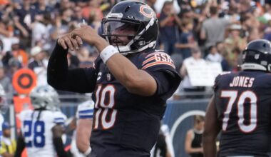 Chicago Bears quarterback Caleb Williams (18) gestures after throwing a touchdown against the Dallas Cowboys during the second half at Soldier Field.