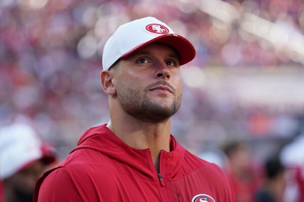 San Francisco 49ers defensive lineman Nick Bosa (97) watches from the sidelines in the first quarter against the Denver Broncos at Levi's Stadium.