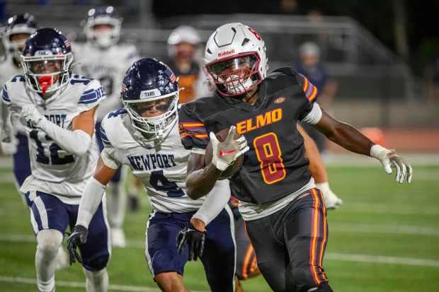 El Modena running back Jericho West, right, breaks into the open to sprint to the end zone for a touchdown against Newport Harbor in a nonleague football game in Orange on Friday, Sept. 5, 2025. (Photo by Paul Rodriguez, Contributing Photographer)