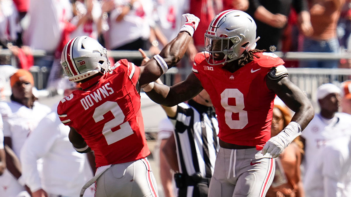 Ohio State Buckeyes safety Caleb Downs (2) and linebacker Arvell Reese (8) celebrate during the second half of the NCAA football game against the Texas Longhorns at Ohio Stadium on Aug. 30, 2025. Ohio State won 14-7.