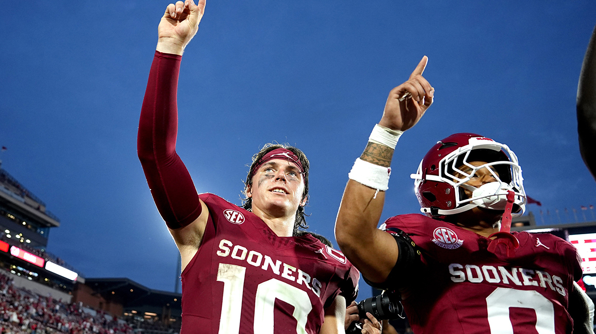 Oklahoma's John Mateer (10) and Jaydn Ott (0) sing the alma mater following the college football game between the University of Oklahoma Sooners and the Illinois State Redbirds at the Gaylord Family Oklahoma Memorial Stadium in Norman, Okla., Saturday, Aug. 30, 2025.