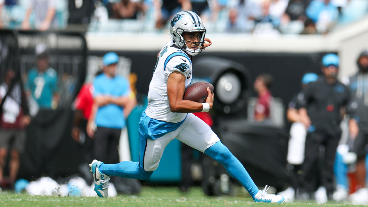 Carolina Panthers quarterback Bryce Young (9) carries the ball against the Jacksonville Jaguars during the first half at EverBank Stadium.