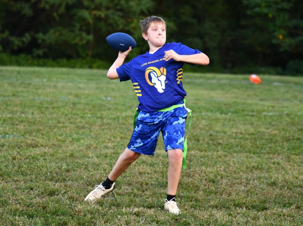 Rams Joey Taylor unloads on a deep pass. (Photo by...