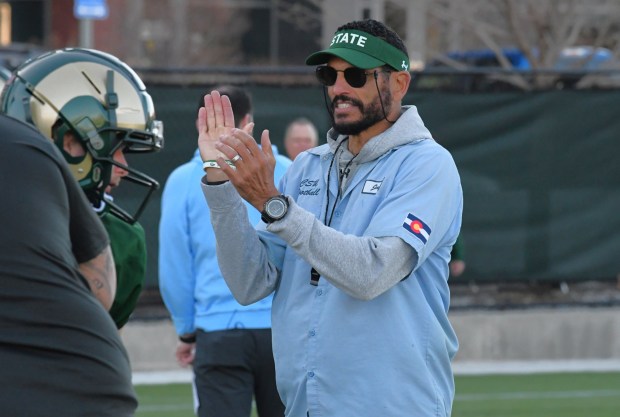 Colorado State head coach Jay Norvell applauds the work of his players during practice last spring at Canvas Stadium in Fort Collins. (Nathan Wright/Loveland Reporter-Herald)