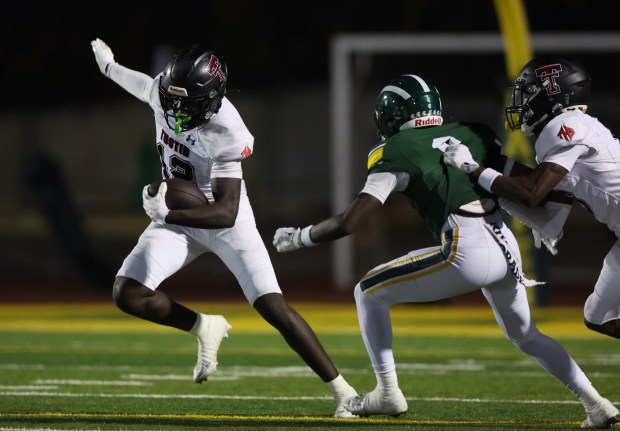 Tustin's Rufai Azeez (12) charges through the field during a game at Damien High School in La Verne on Friday, Sept. 12, 2025. (Photo by Trevor Stamp, Contributing Photographer)